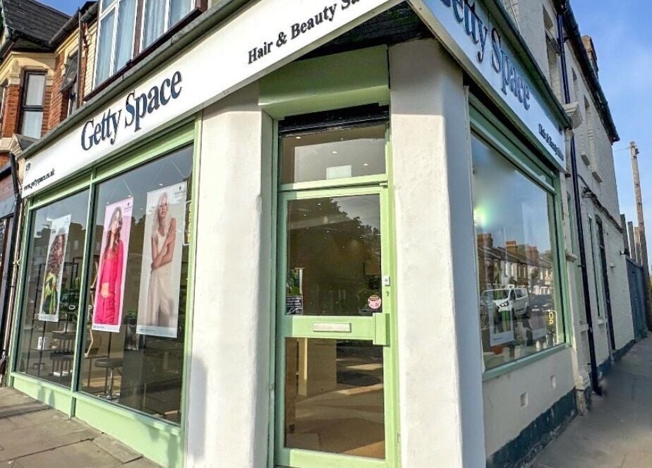 Front view of Getty Space salon in London, England, GB with stylish window displays.