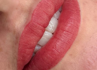 Close-up of vibrant red lips, expertly treated at L’essence Beauty By Ranielly, Waterford, County Waterford, IE.