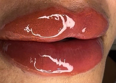 Glossy, enhanced lips showcasing beauty treatment at Contour Me, Aubin Grove, Western Australia, AU.