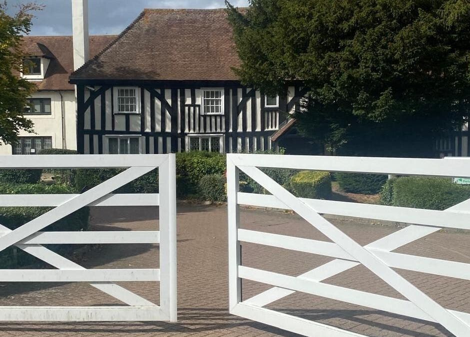 Ebbsfleet Aesthetics entrance with white gates, Northfleet, England, GB.