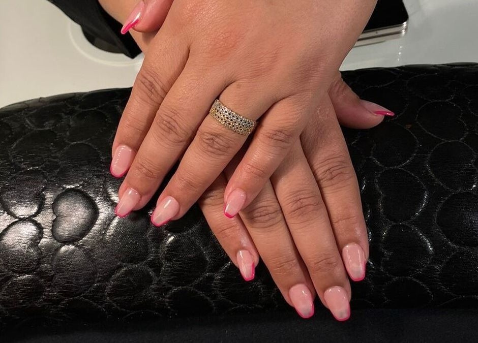 Perfect pink-tipped nails at Clue Salon, Riyadh, Riyadh Province, SA, showcasing elegant nail art.