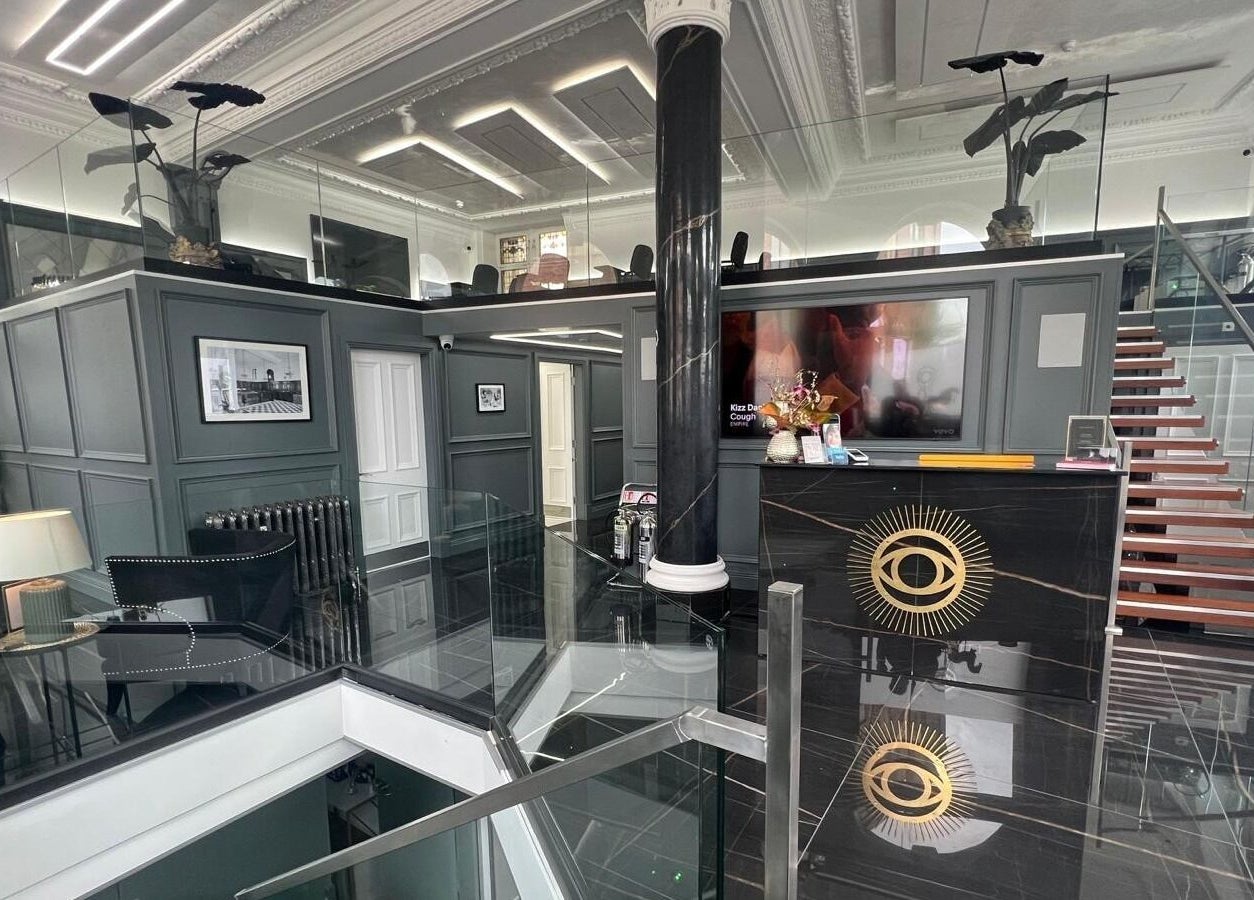 Luxurious reception area at NEU® Cosmetic Clinic Glasgow, showcasing modern design. Located in Glasgow, Scotland, GB.