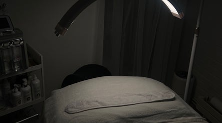 Relaxing treatment room at BeauElite - Southampton, Fareham, England, GB, featuring massage bed and equipment.