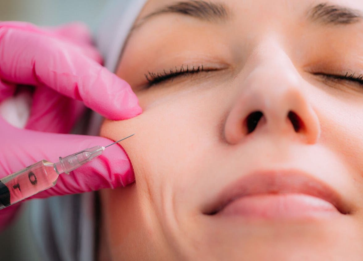 Facial injection at De-Vaux Aesthetics, Tattingstone, England, GB enhancing facial beauty.