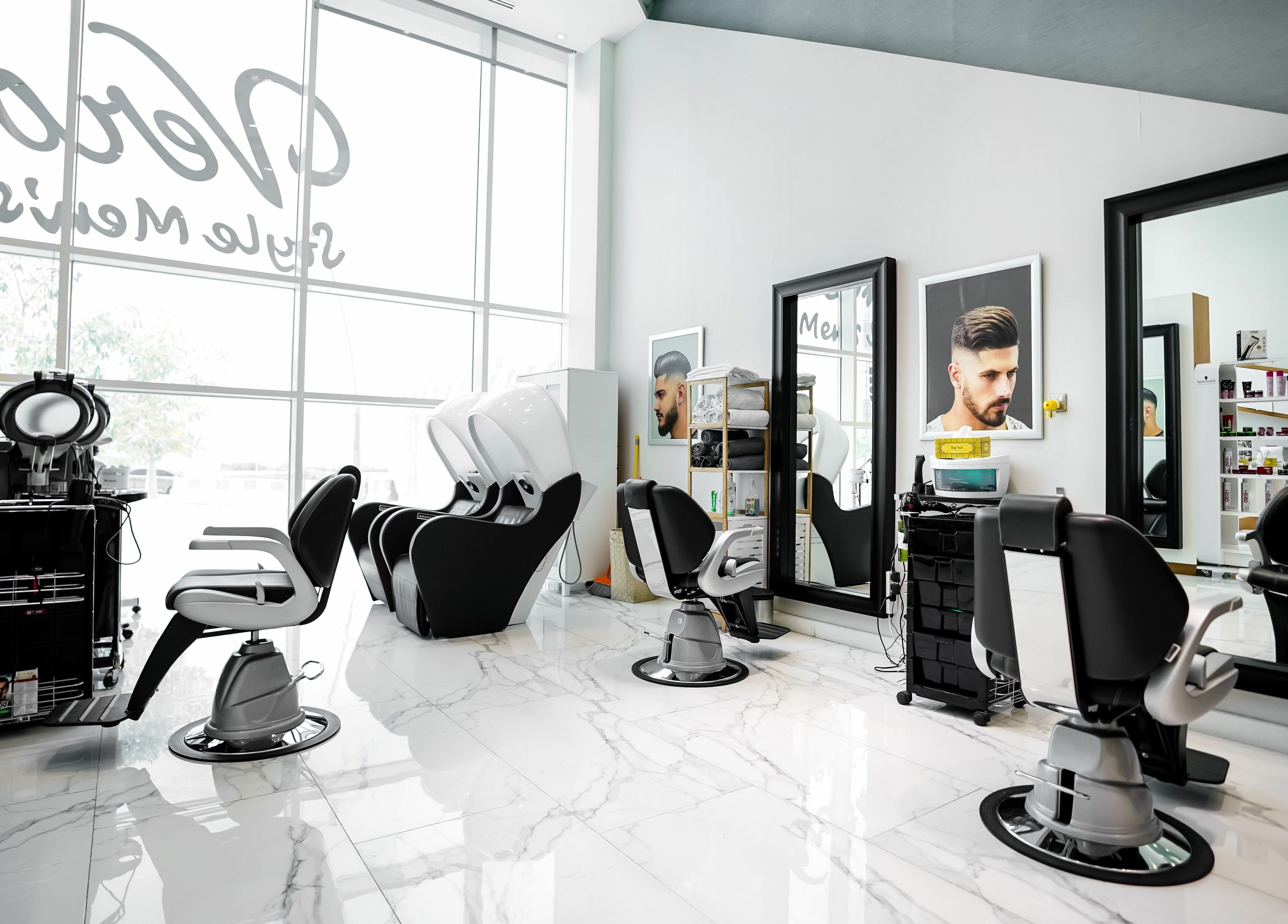 Stylish interior of Verona Style Mens Salon in Abu Dhabi, AE featuring modern barber chairs and sleek design.