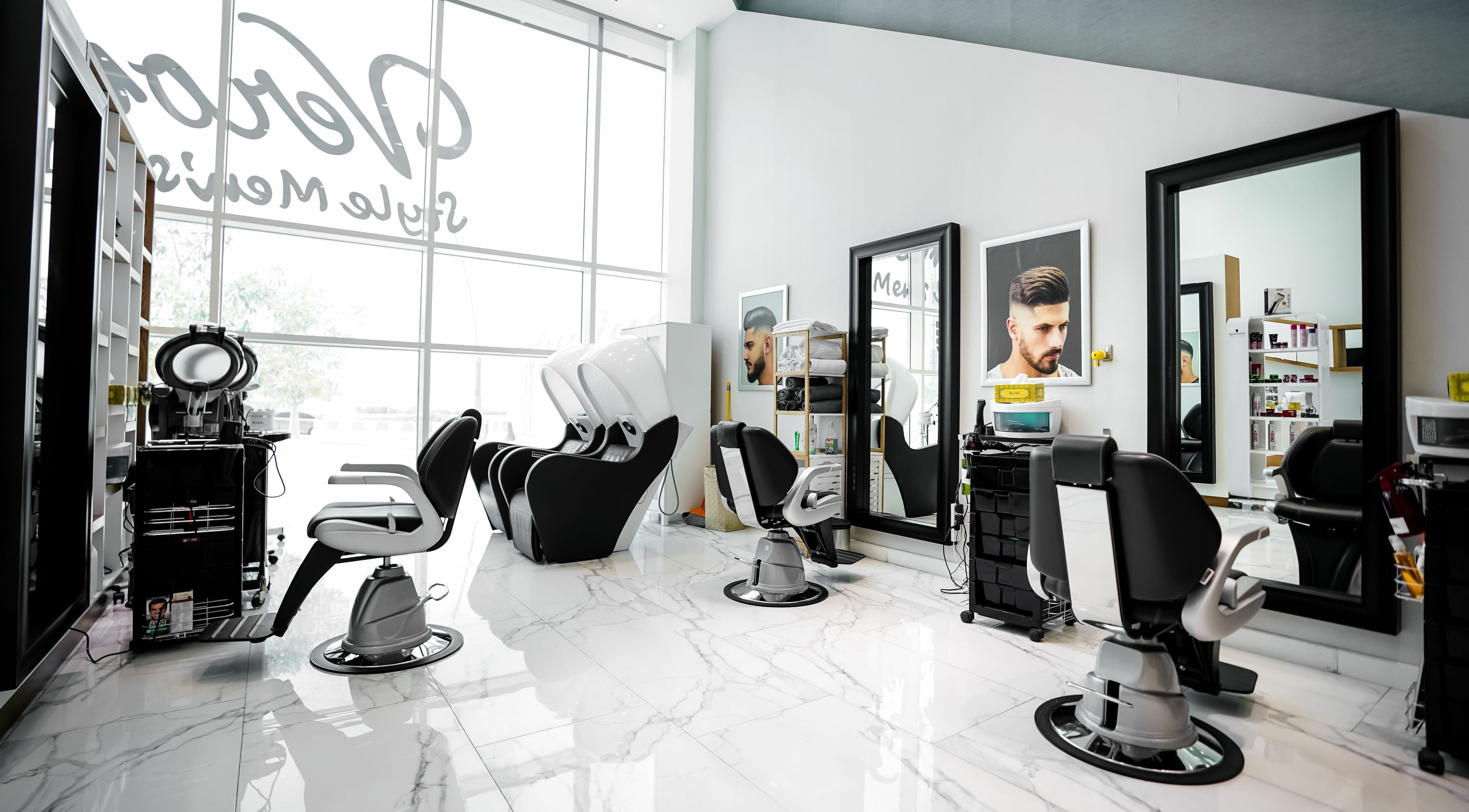 Stylish interior of Verona Style Mens Salon in Abu Dhabi, AE featuring modern barber chairs and sleek design.