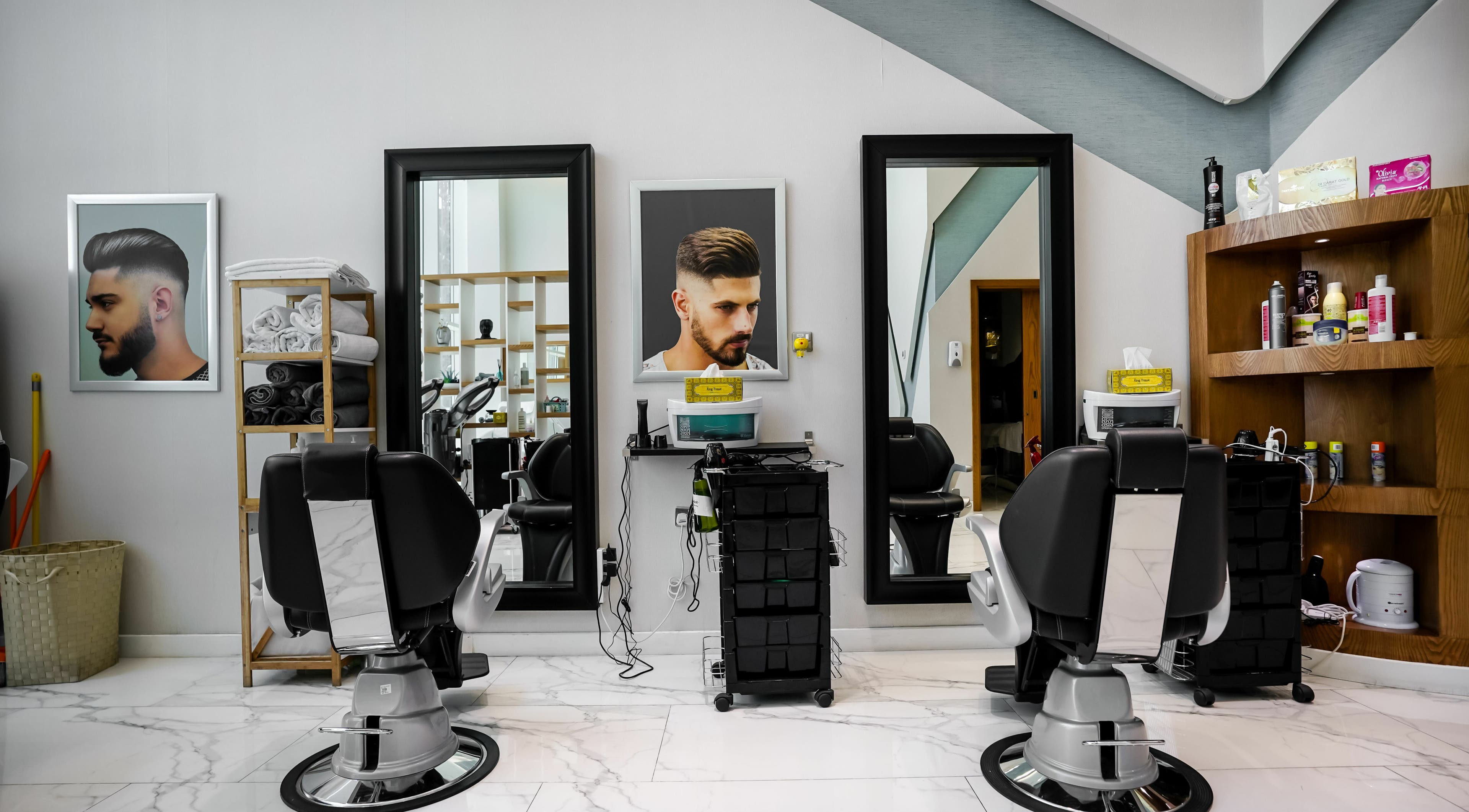 Modern barber chairs and styling products at Verona Style Mens Salon, Abu Dhabi, AE.