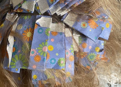Detailed close-up of colorful foils at Iliana’s Hair Salon, Chineham, England, GB.