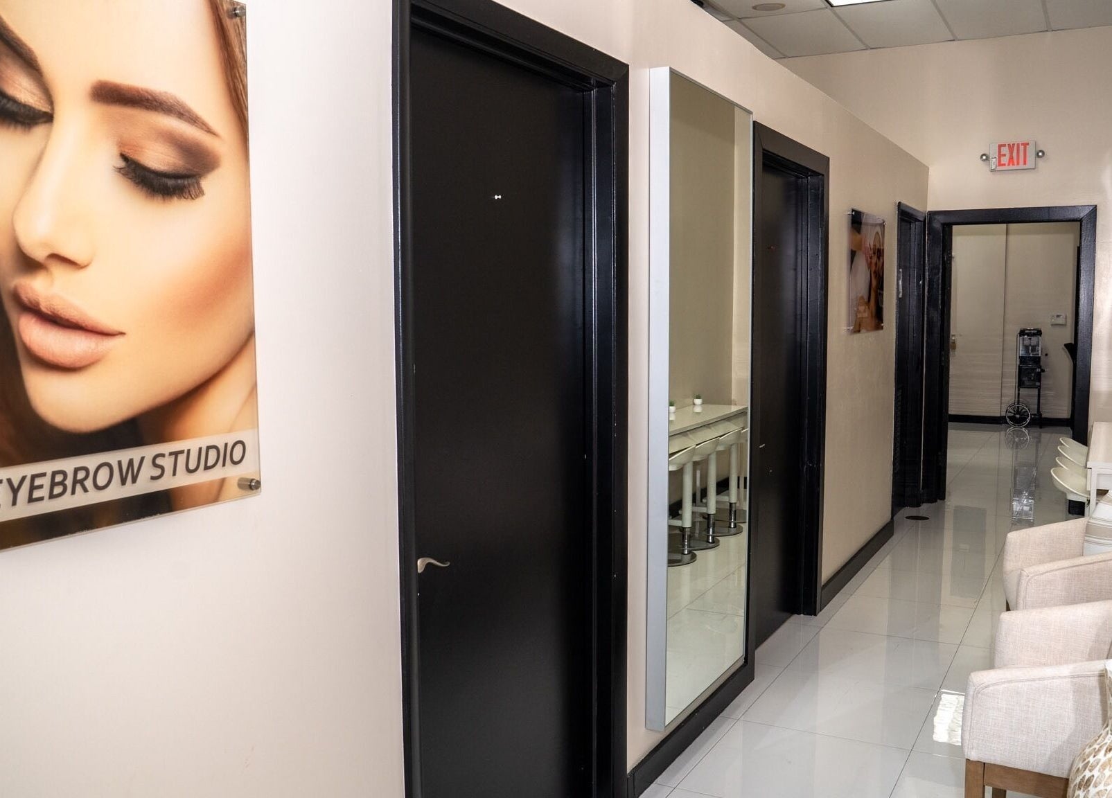 Chic interior hallway of RÊVE AESTHETICS by eyebrow studio in Doral, Florida, US with stylish decor.