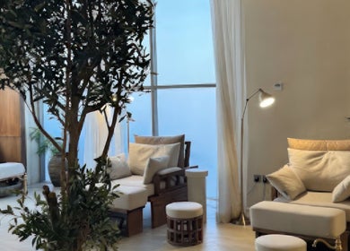 Cozy seating area with soft lighting at Kedhab Spa I خضاب سبا in Riyadh, Riyadh Province, SA.