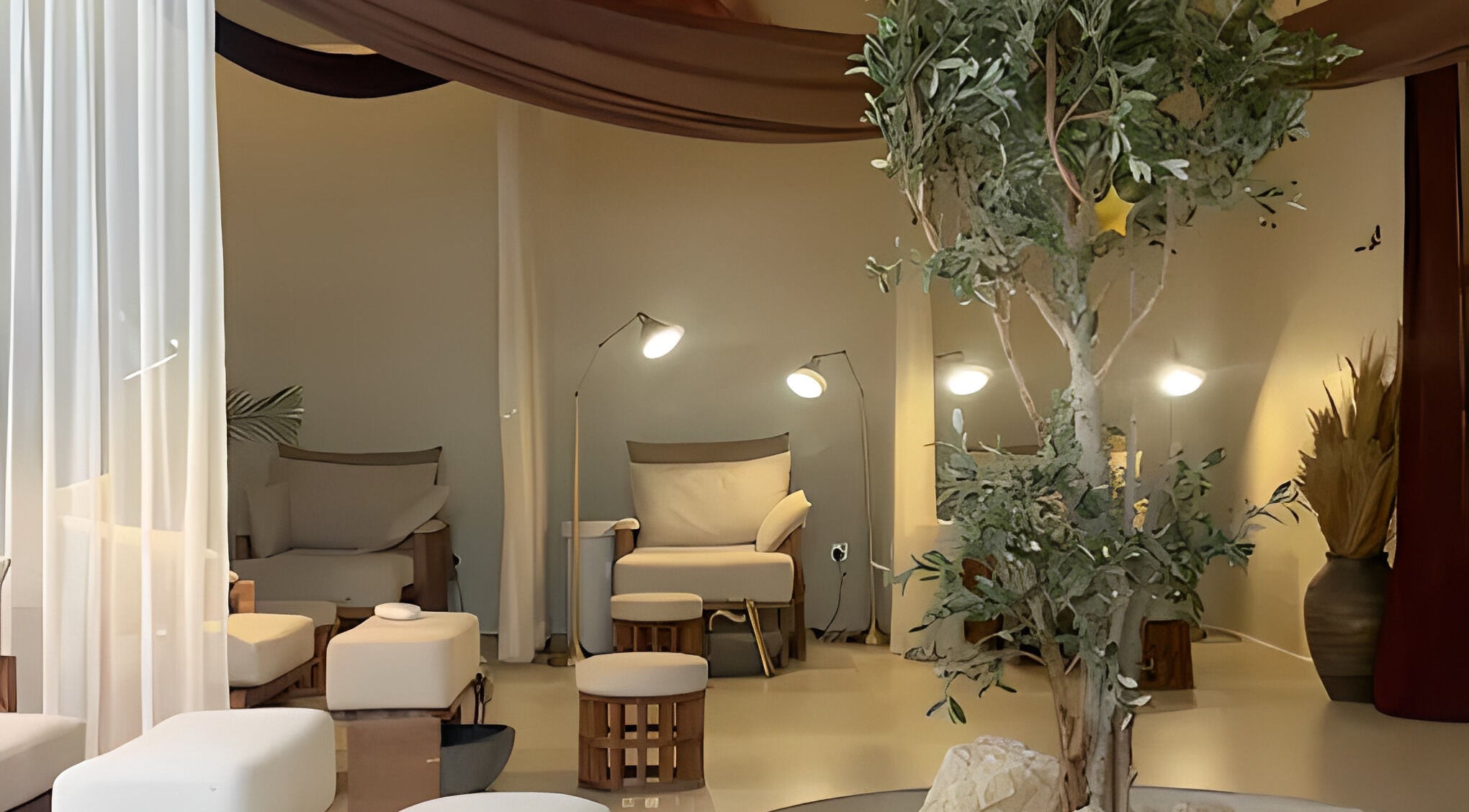 Relaxing seating area at Kedhab Spa I خضاب سبا, Riyadh, Riyadh Province, SA, with cozy chairs and ambient lighting.