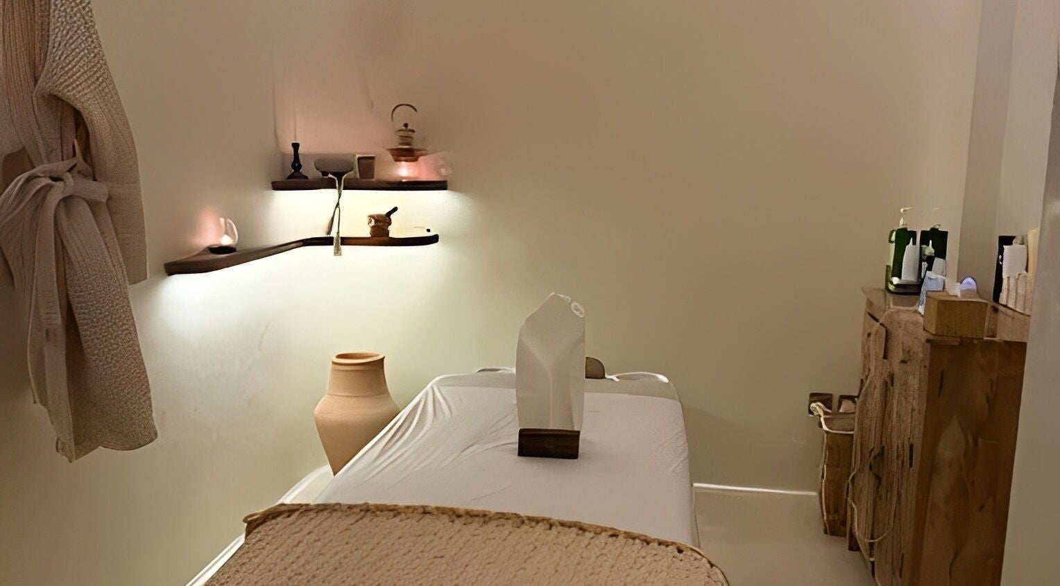 Calming massage room at Kedhab Spa I خضاب سبا, Riyadh, Riyadh Province, SA with ambient lighting and decor.