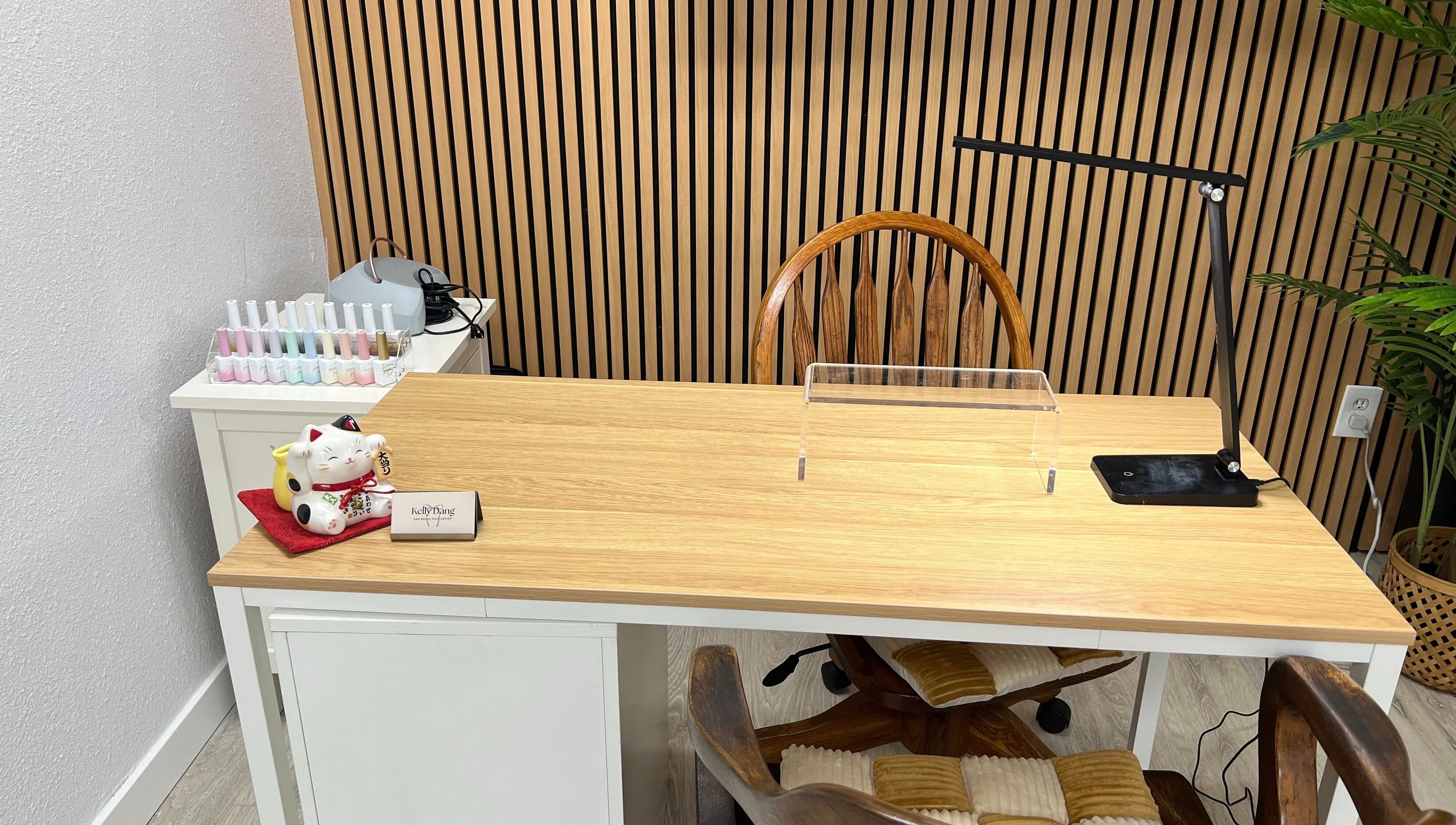 Elegant nail station at Nails by Kelly in San Diego, California, US, featuring modern decor and manicure tools.