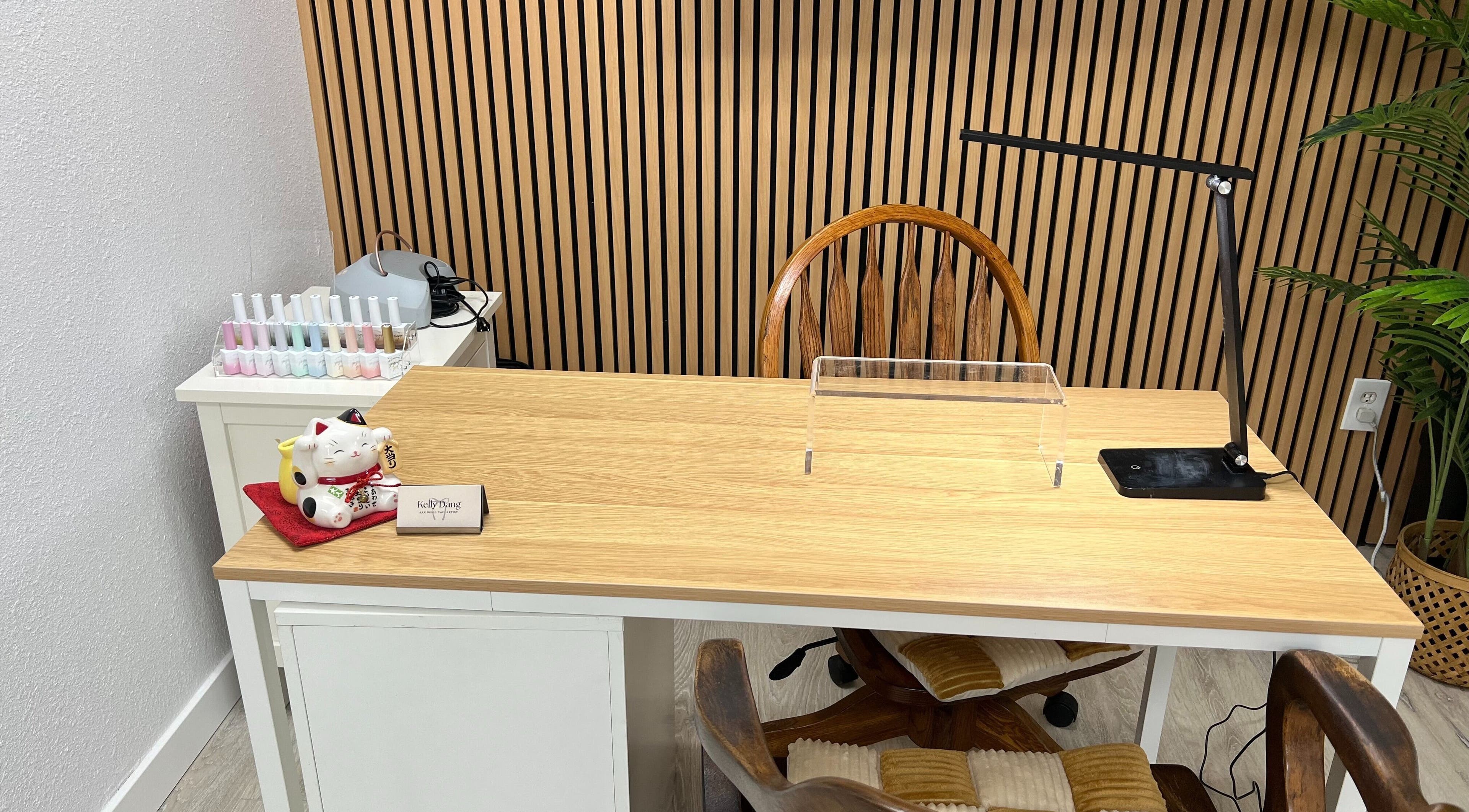 Elegant nail station at Nails by Kelly in San Diego, California, US, featuring modern decor and manicure tools.