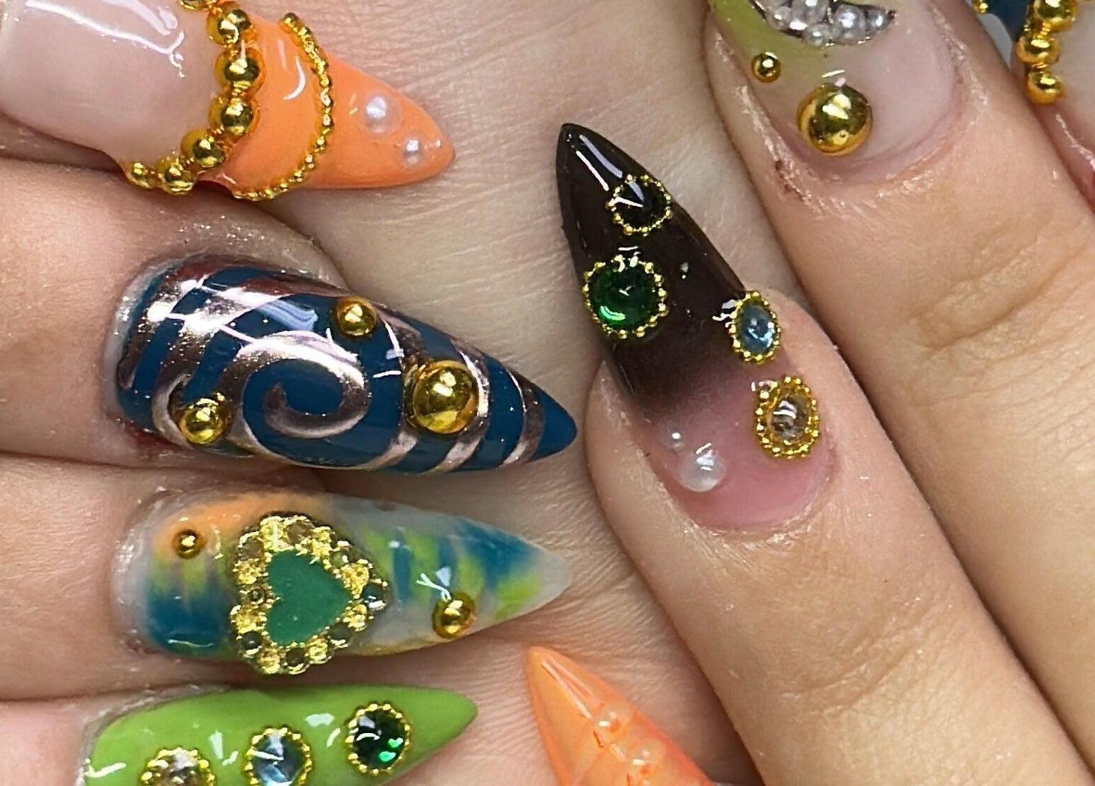 Colorful nail art design at Nails by Kelly, San Diego, California, US. Unique and intricate styles.