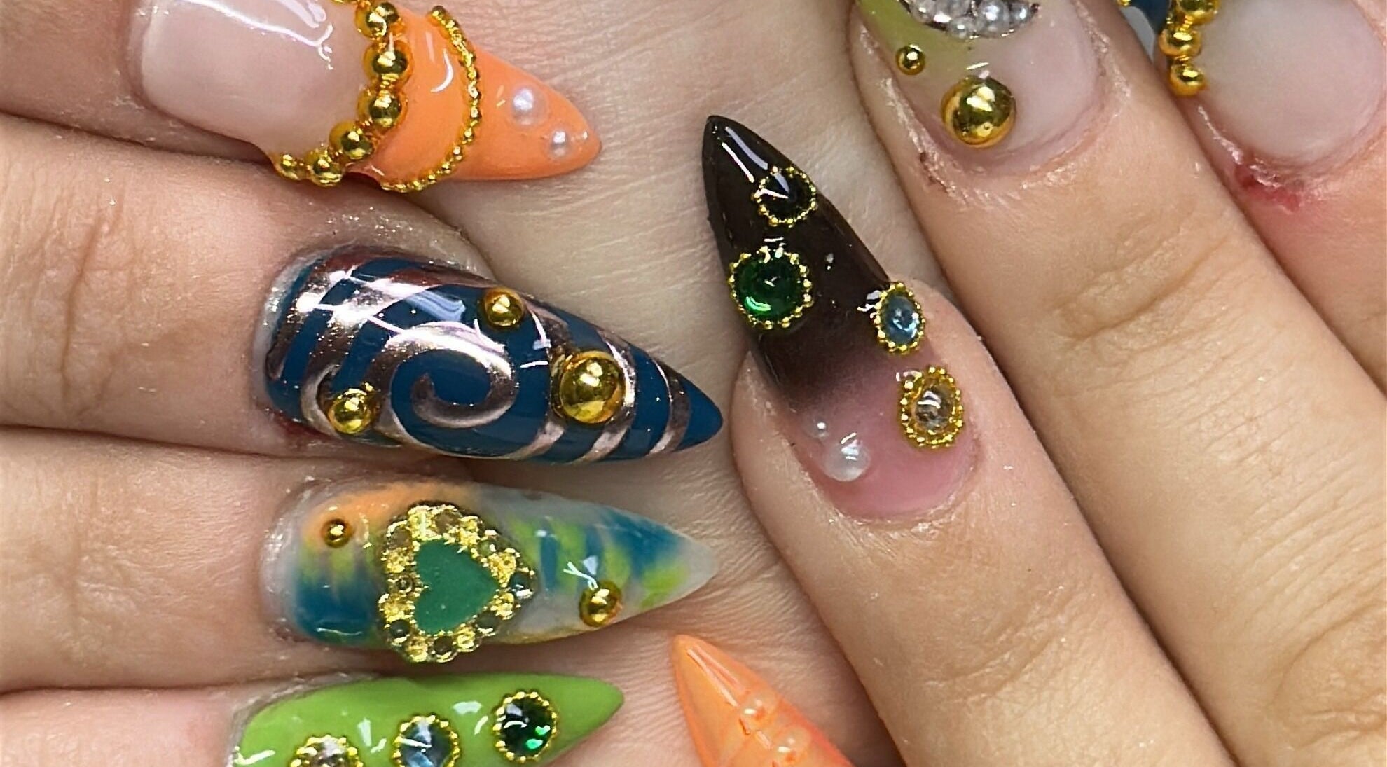 Colorful nail art design at Nails by Kelly, San Diego, California, US. Unique and intricate styles.