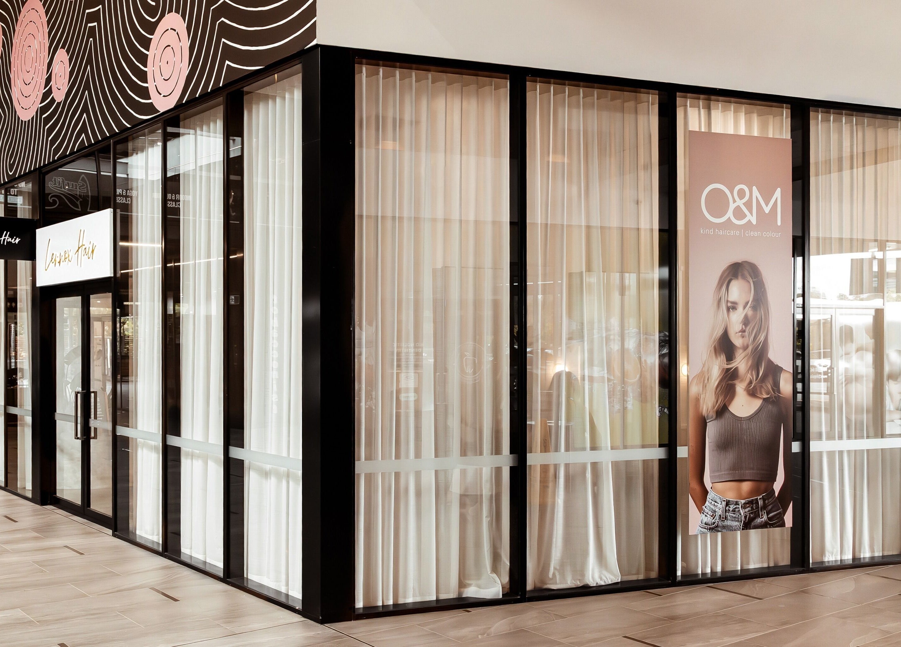 Lennox Hair salon's stylish exterior in Lennox Head, New South Wales, AU, featuring modern design and signage.