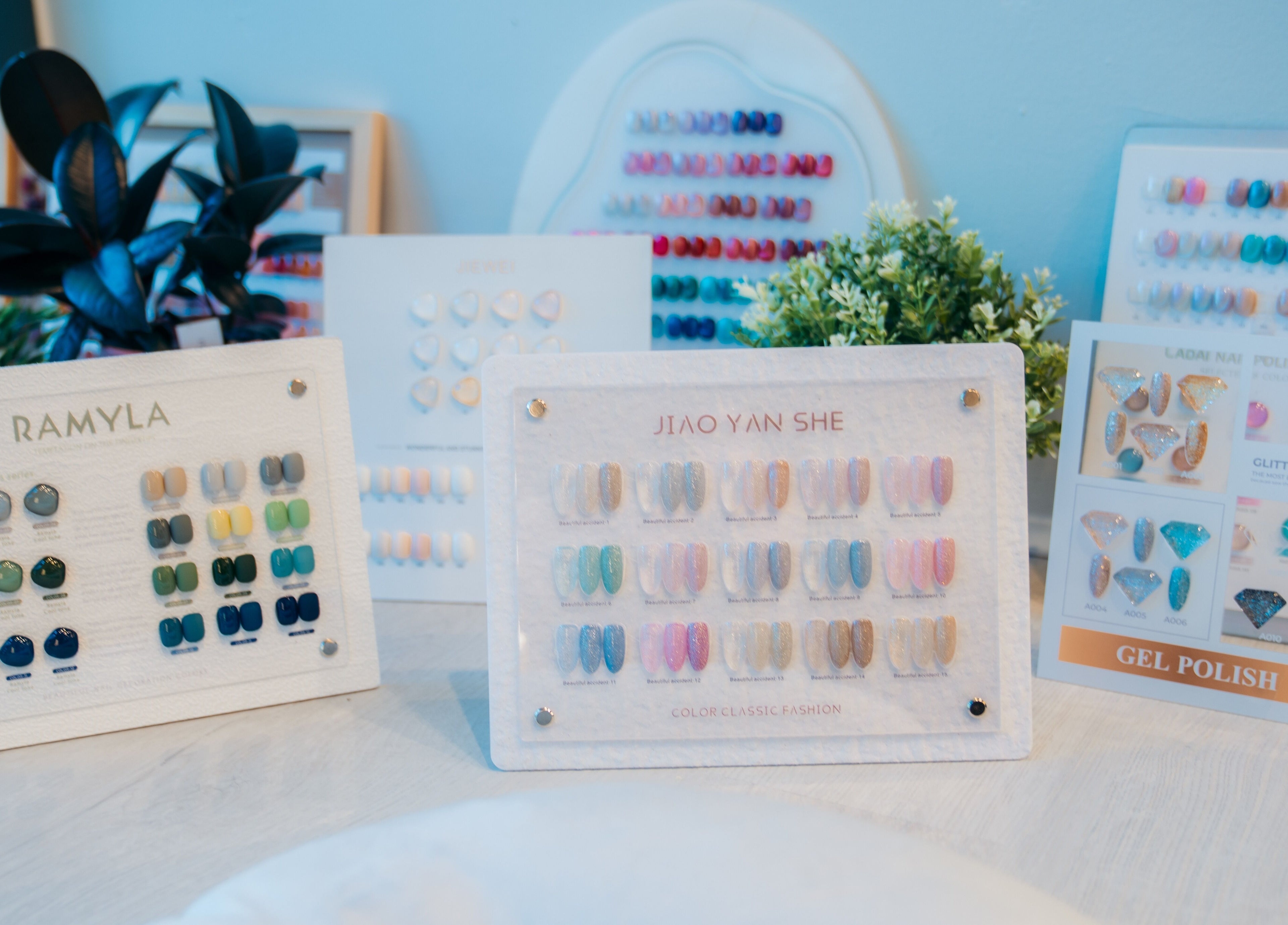 Nail polish color displays at Robson Nails & Spa, Vancouver, British Columbia, CA, showcasing diverse shades.