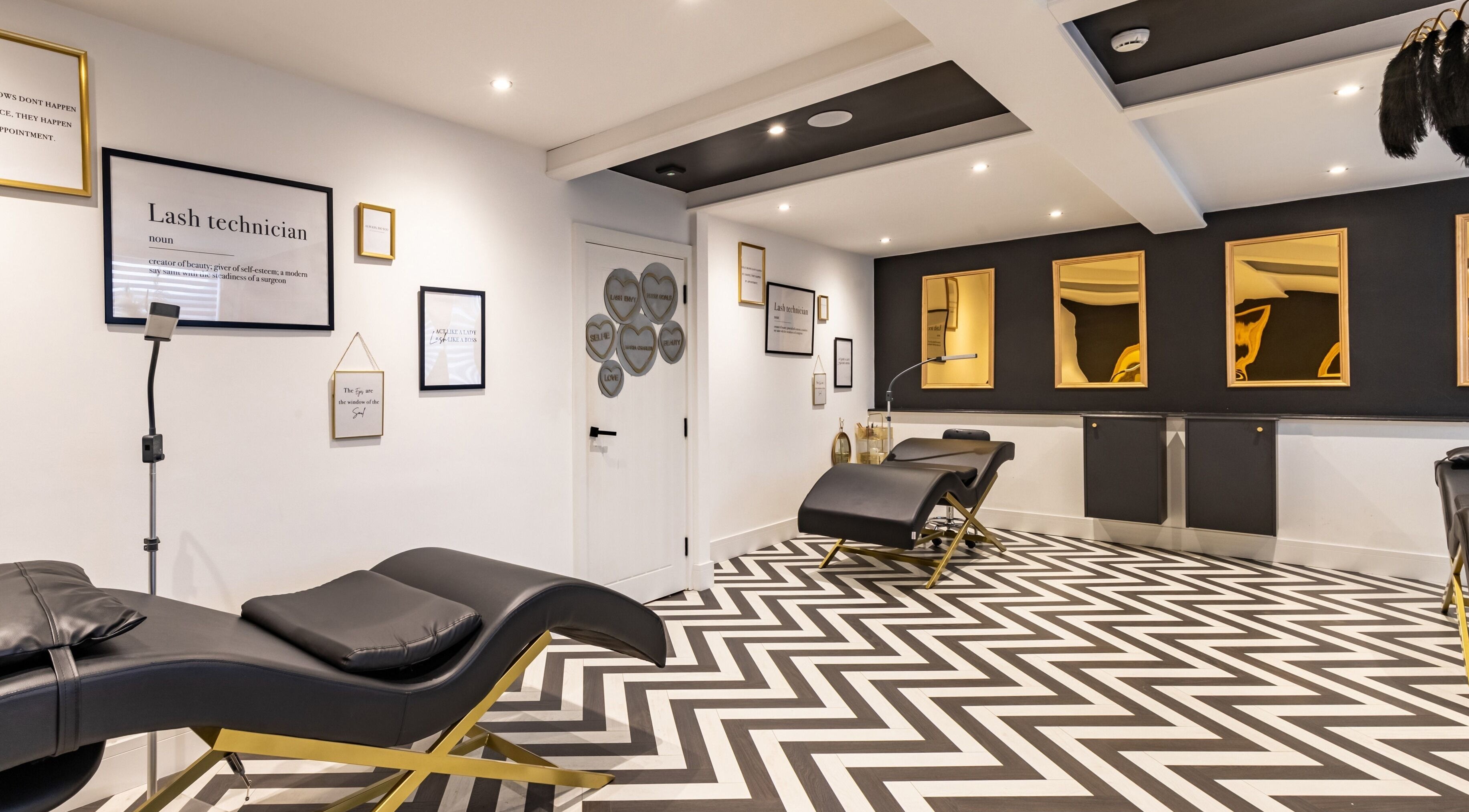Elegant beauty lounge at Maria Charles Beauty Crawley, featuring stylish decor and treatment chairs in Crawley, England, GB.
