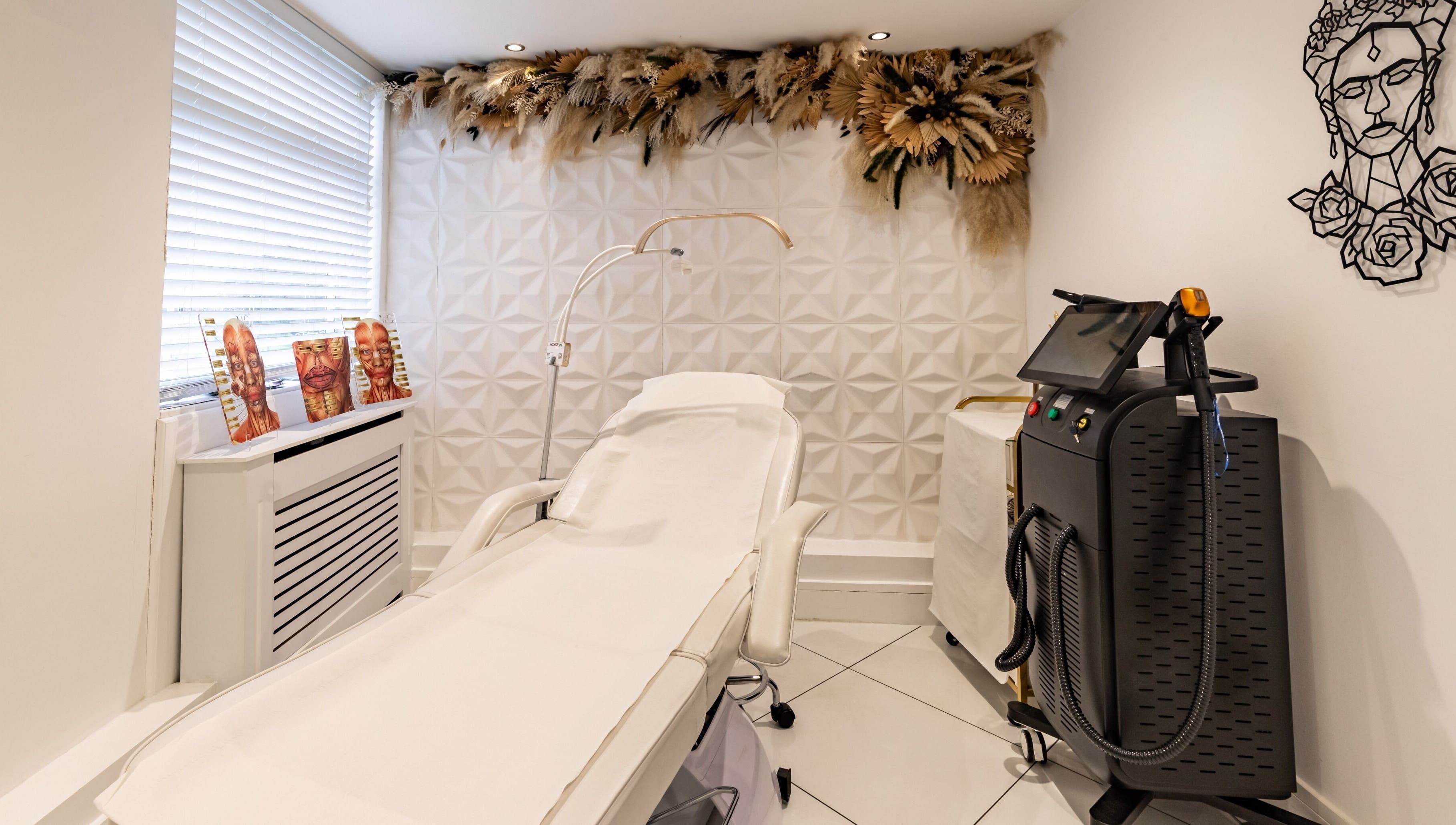 Elegant treatment room at Maria Charles Aesthetics Crawley, featuring modern decor in Crawley, England, GB.