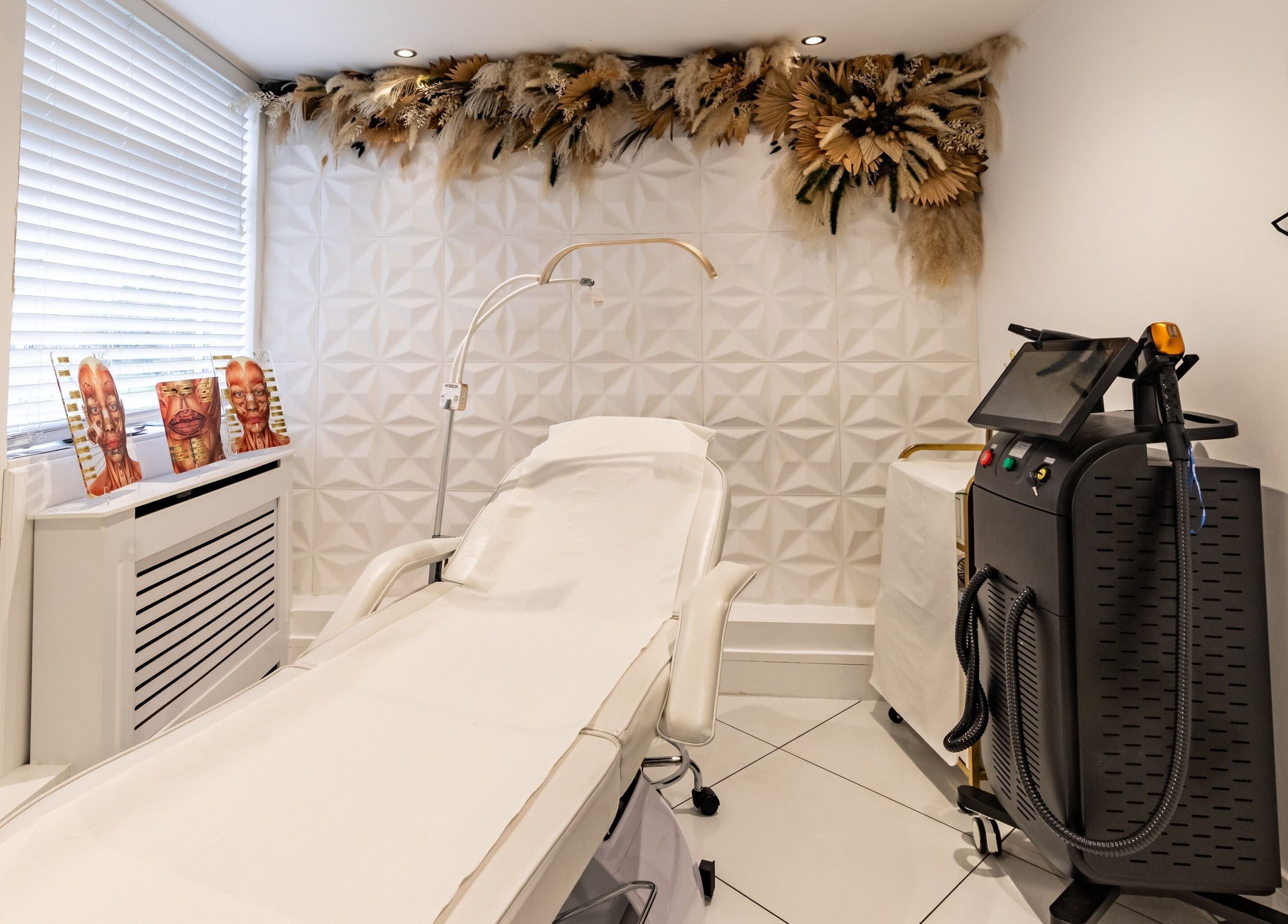Elegant treatment room at Maria Charles Aesthetics Crawley, featuring modern decor in Crawley, England, GB.