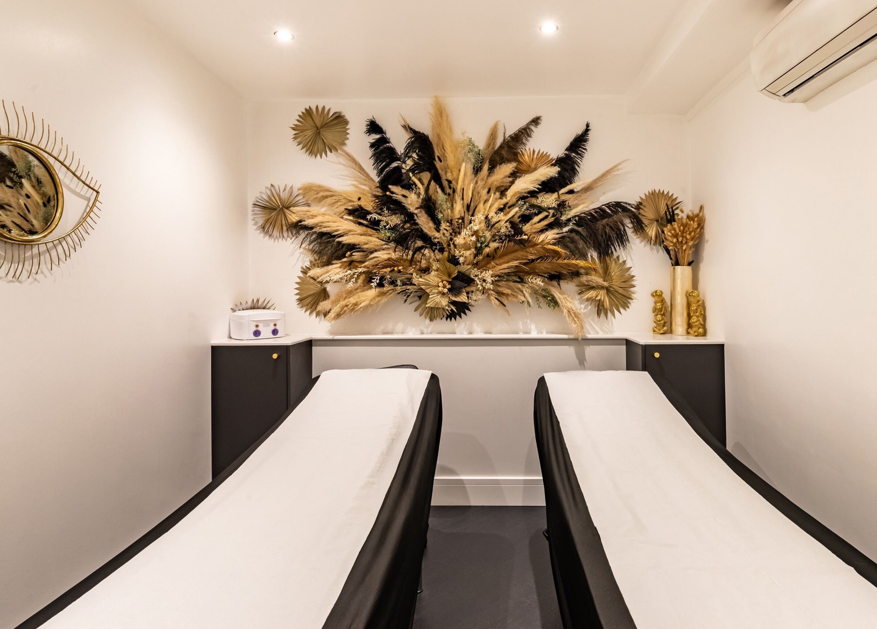 Relaxing treatment room with elegant decor at Maria Charles Aesthetics Crawley, Crawley, England, GB.