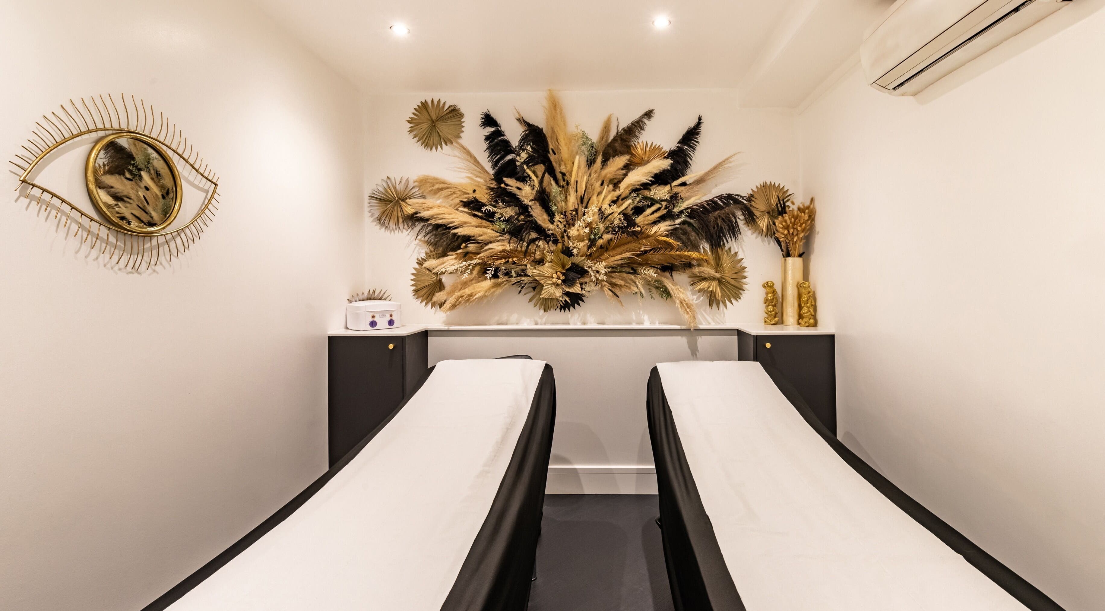 Relaxing treatment room with elegant decor at Maria Charles Aesthetics Crawley, Crawley, England, GB.
