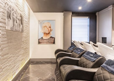 Luxurious salon chairs at Maria Charles Hair Crawley, Crawley, England, GB offering premium hair treatment.