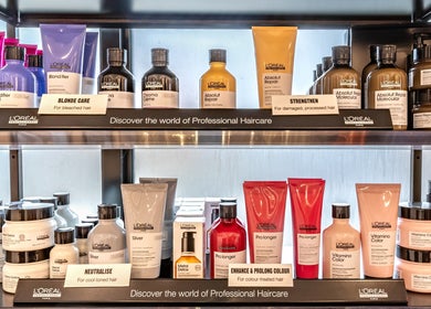 Premium L'Oréal hair products displayed at Maria Charles Hair Crawley, Crawley, England, GB.
