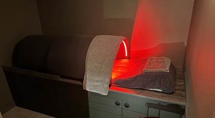 Relaxing infrared therapy bed at SweatLounge Chiswick, London, England, GB, promoting wellness and relaxation.