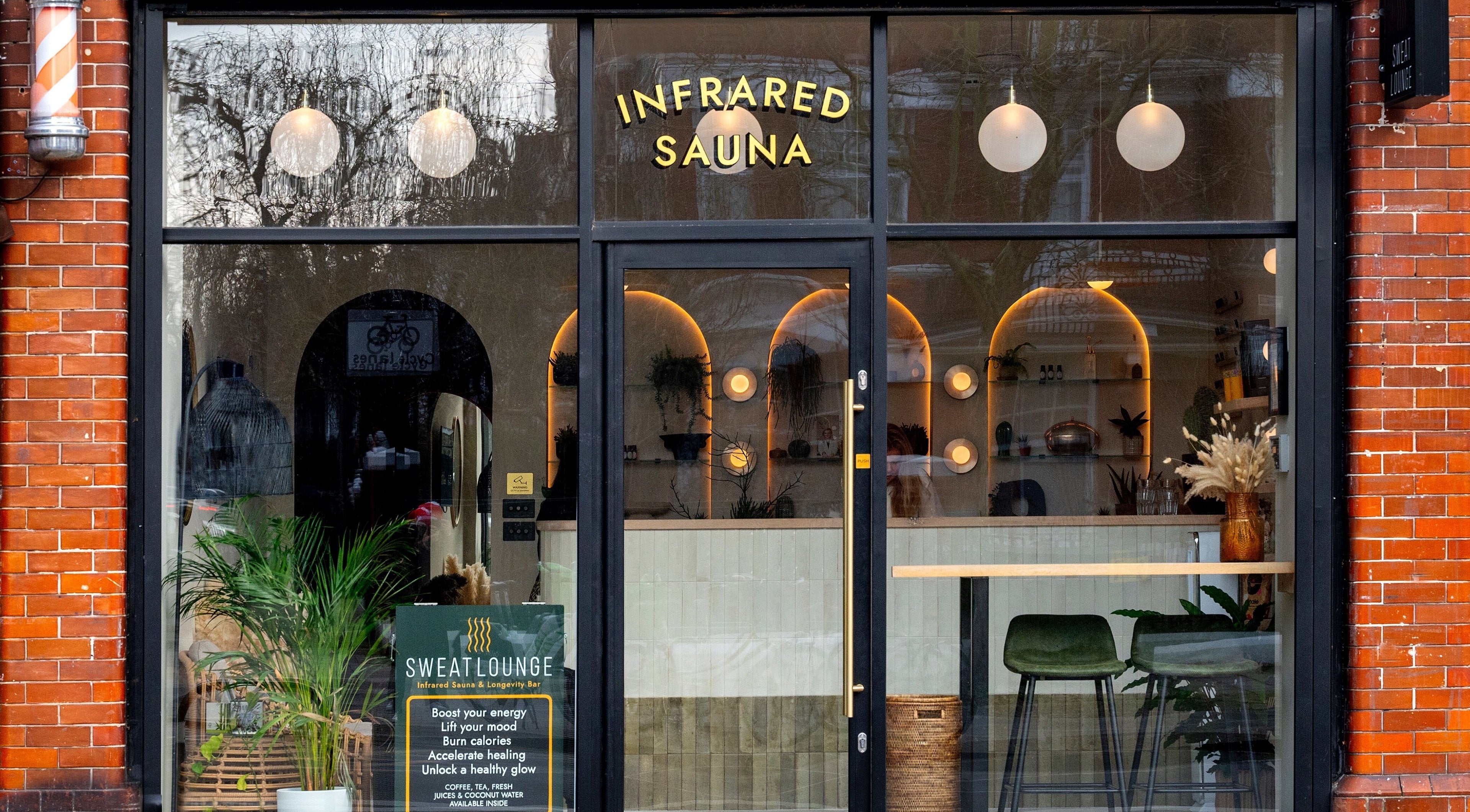 Facade of SweatLounge Chiswick, featuring inviting infrared sauna in London, England, GB.