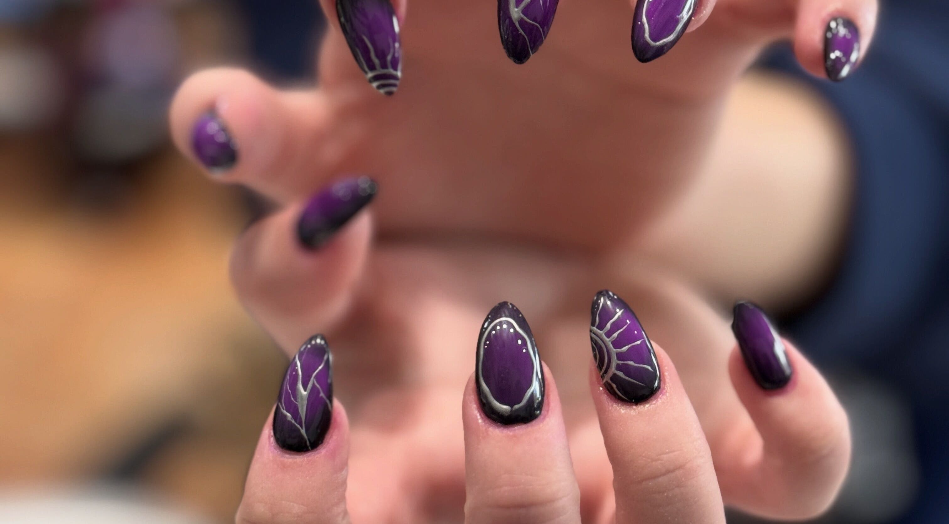 Bold purple nail art from Bee Sassy Nails, Rocklin, California, US, showcasing intricate design.