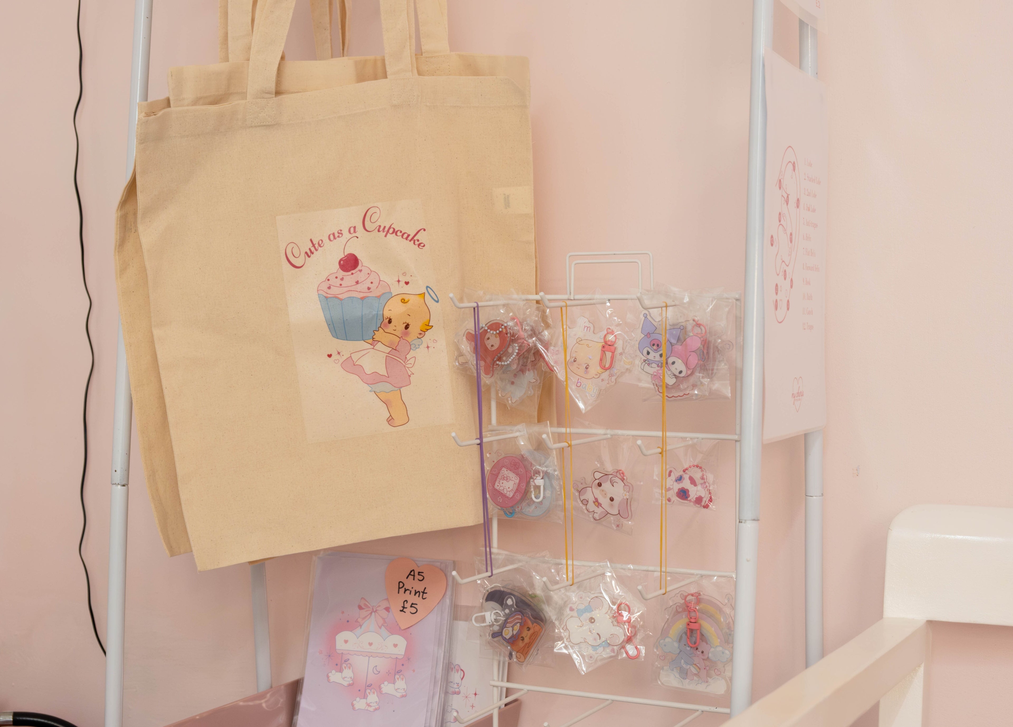 My Cherie Studio in London, England, GB features a chic display of cute tote bags and keychains.
