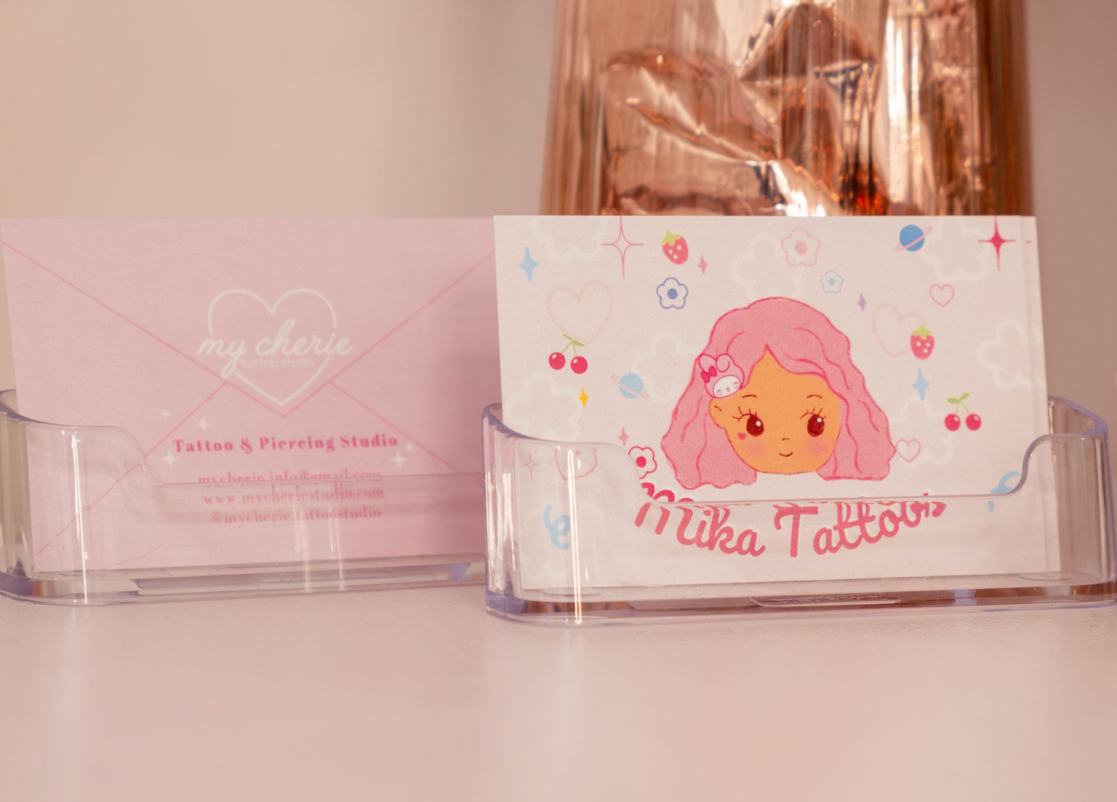 My Cherie Studio's charming business cards in London, England, GB, featuring playful and creative designs.