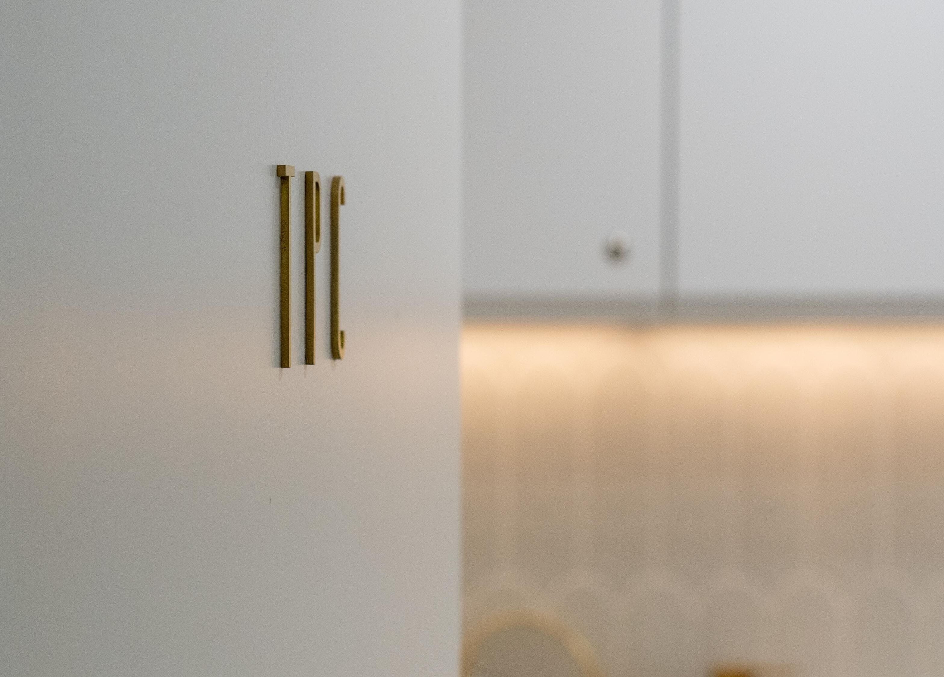 Elegant TPC initials at The Preventative Collective, West Leederville, Western Australia, AU.