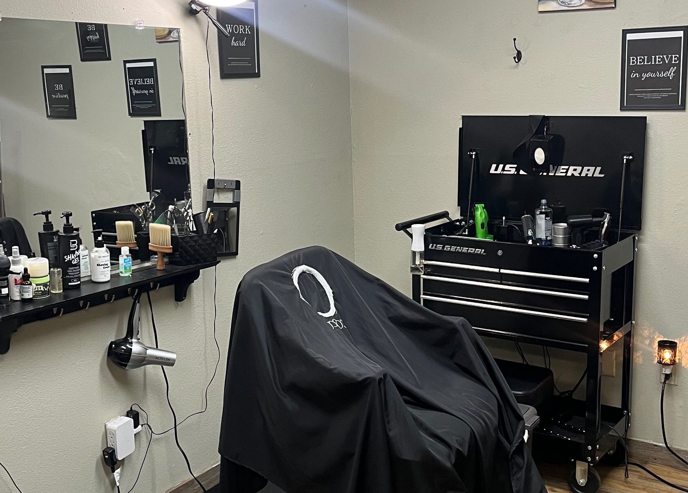 Cozy barbershop setup at Cutz & Fades with Kawone, Lone Grove, Oklahoma, US.