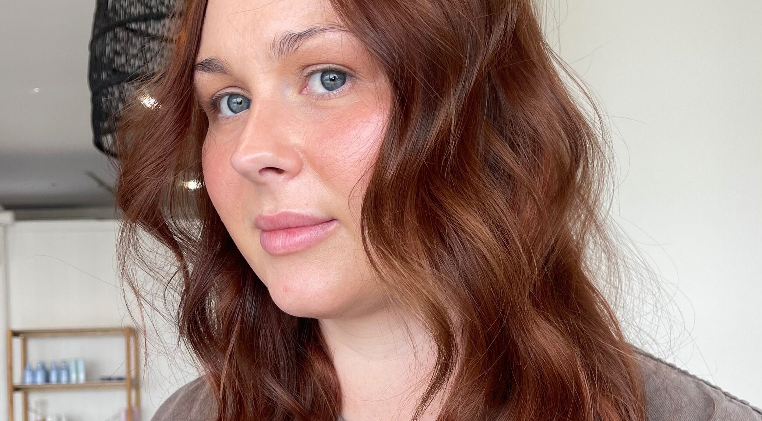 Brunette woman with wavy hair styled at Hair by Cher, Mooloolaba, Queensland, AU.