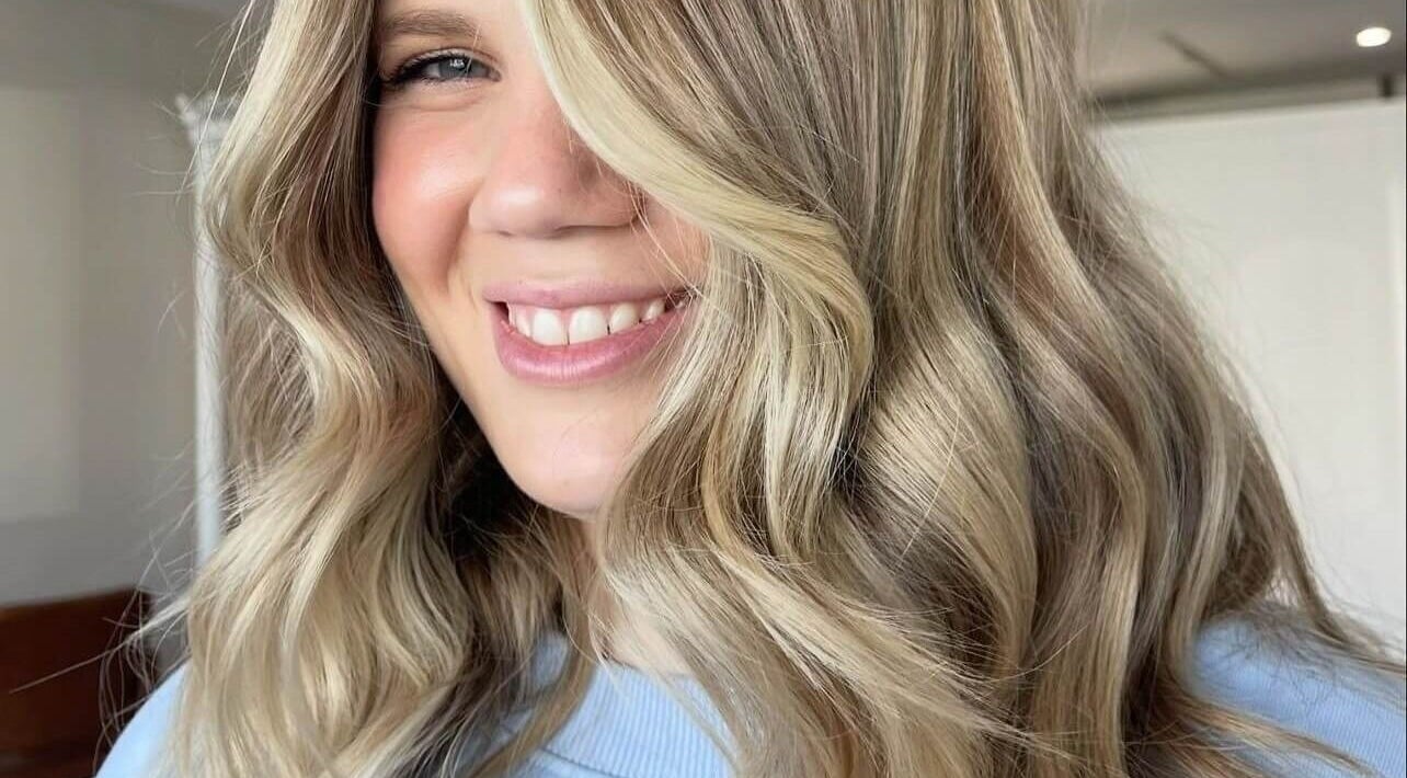 Blonde waves styled at Hair by Cher in Mooloolaba, Queensland, AU showcase expert craftsmanship.