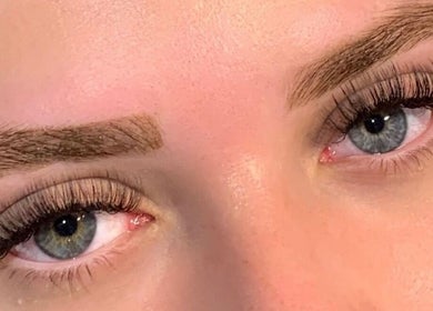 Close-up of eyelash extensions at Arched Aesthetics Nz, Paeroa, Waikato, NZ. Perfectly groomed lashes and brows.