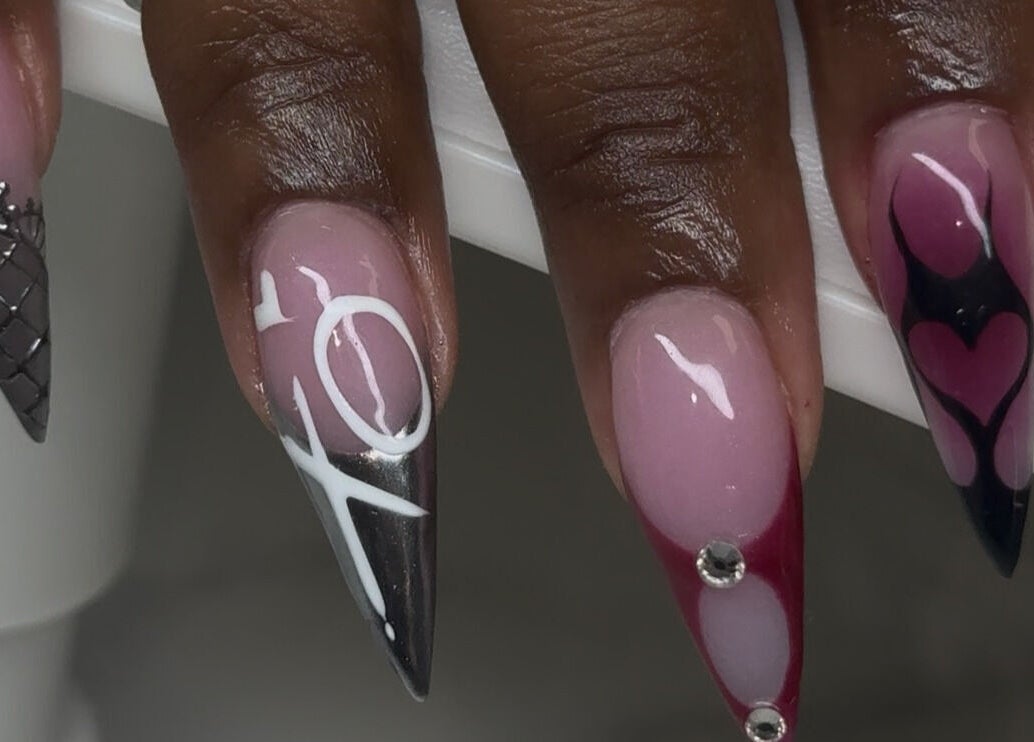 Artistic nail designs at Velvet Varnish Lounge, Spring, Texas, US - intricate patterns and embellishments.