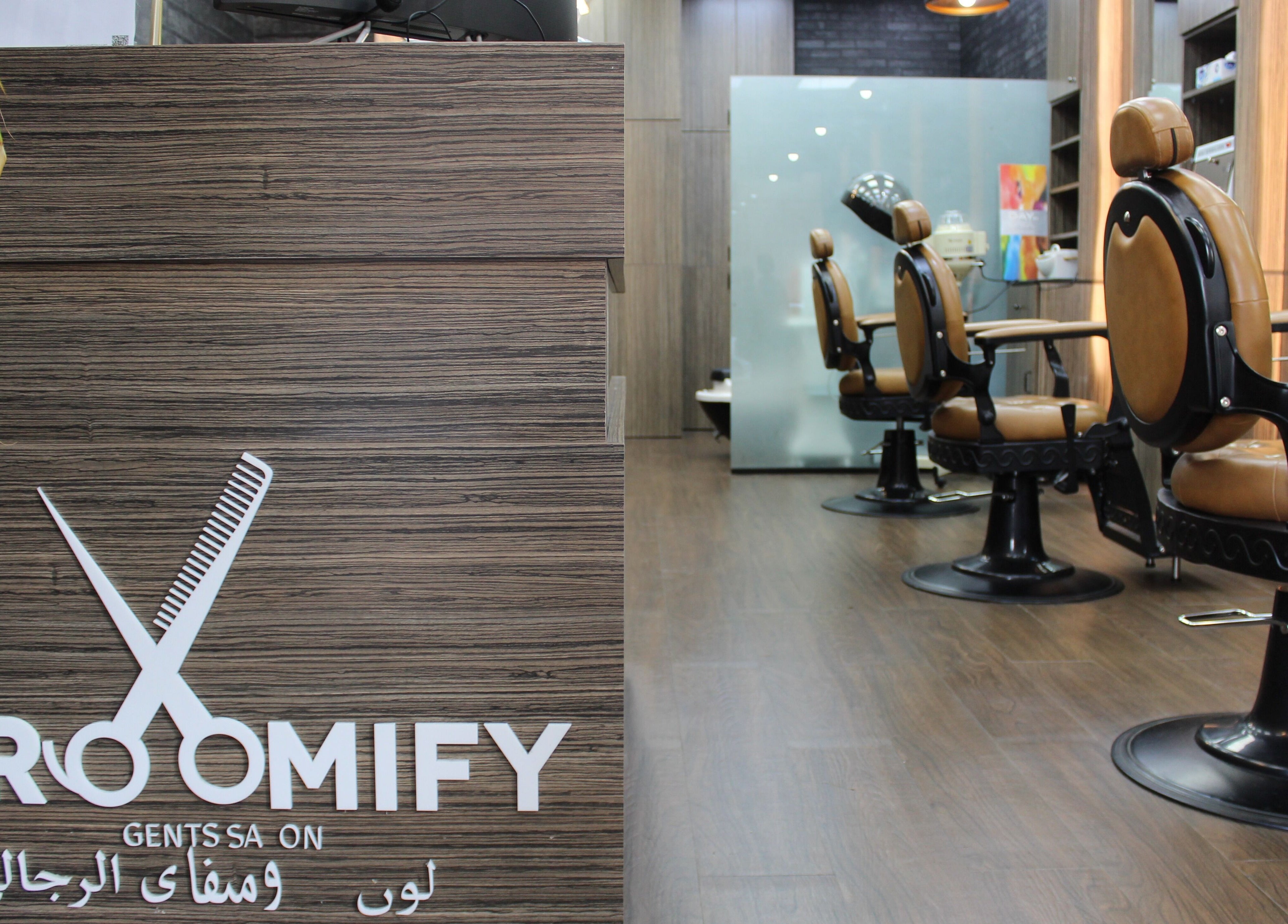 Modern barber chairs inside Groomify Gents Salon, Abu Dhabi, AE with stylish decor and elegant setup.