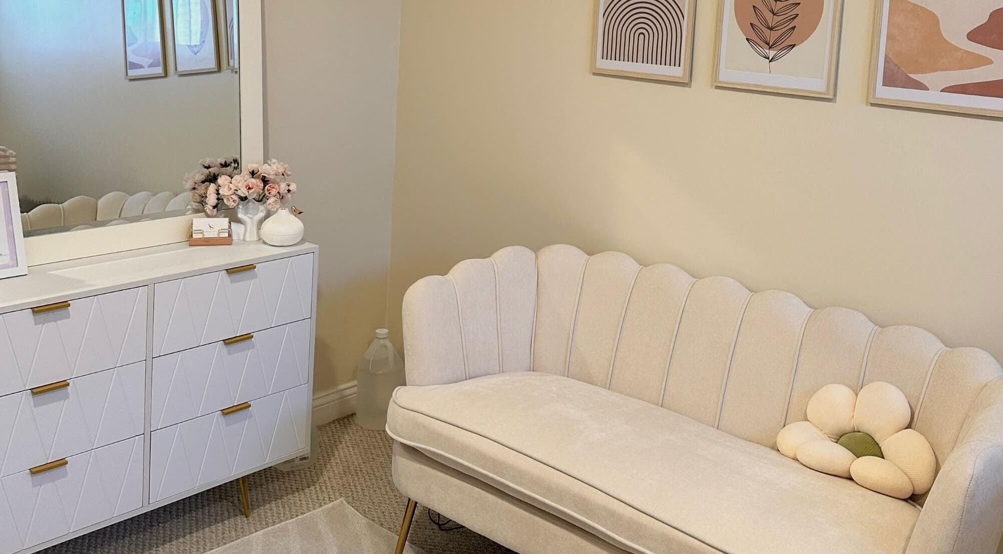 Elegant lounge with soft hues at ArisoStudio, Chicago, Illinois, US, offering a serene atmosphere.