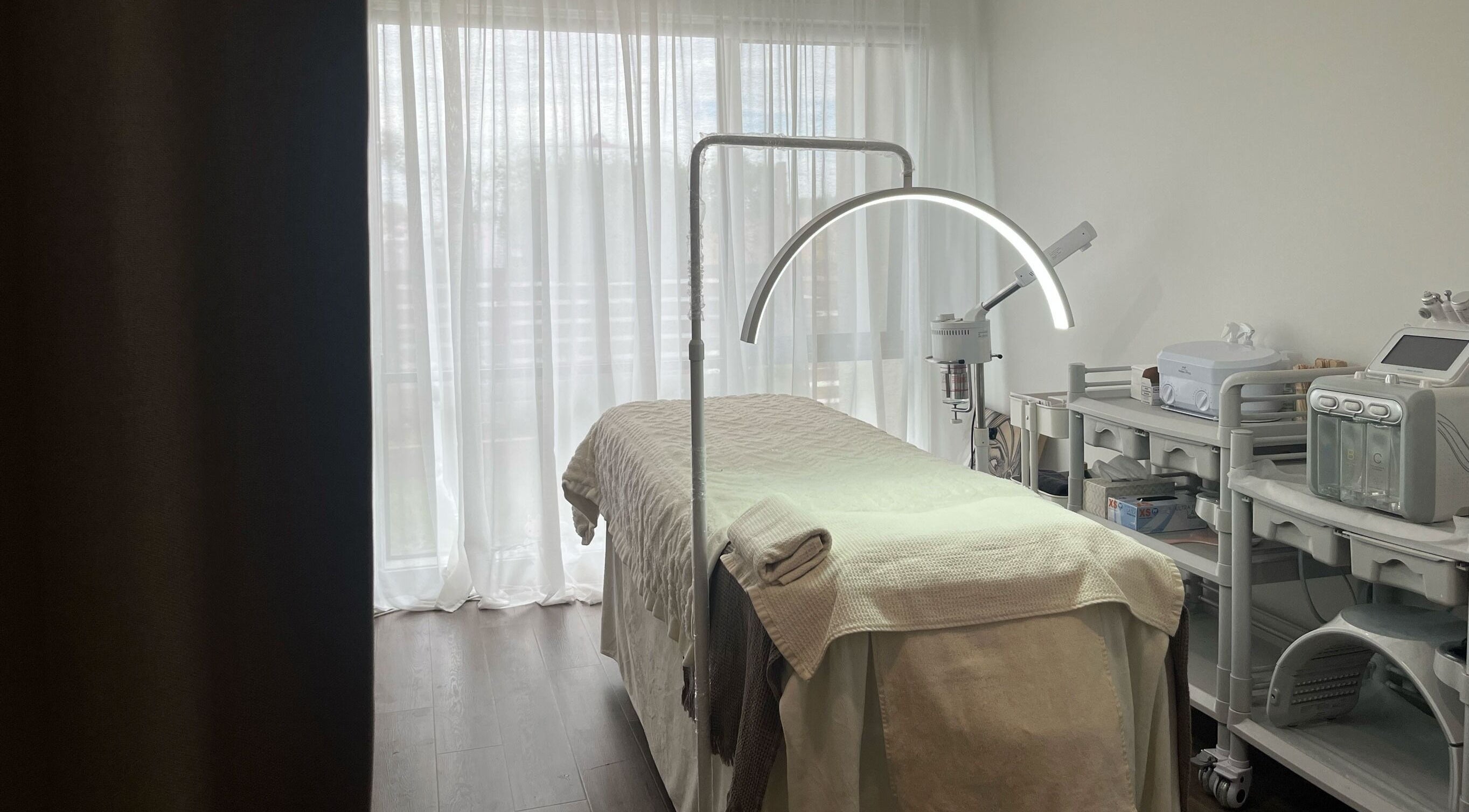 Tranquil treatment room at Peony May Beauty Lounge, Truganina, Victoria, AU, featuring a comfortable massage table.