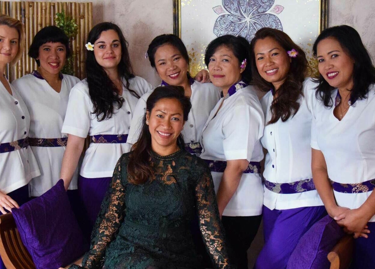 Balima Day Spa staff smiling in Genève, Genève, CH, showcasing a welcoming and professional atmosphere.