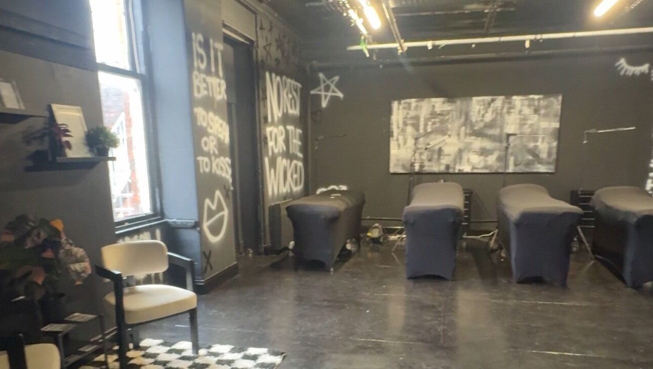Modern interior of PrioriTEA Brow & Lash Co. in Glasgow, Scotland, GB with stylish decor and treatment beds.
