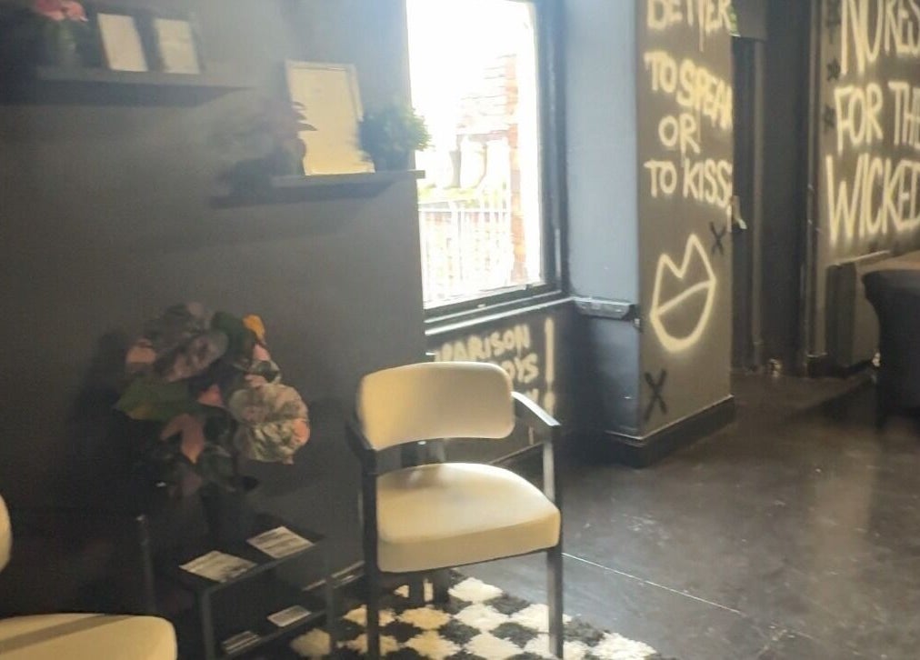 Modern interior of PrioriTEA Brow & Lash Co. in Glasgow, Scotland, GB, showcasing stylish seating and decor.