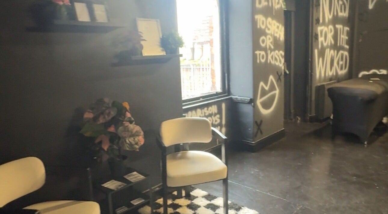 Modern interior of PrioriTEA Brow & Lash Co. in Glasgow, Scotland, GB, showcasing stylish seating and decor.