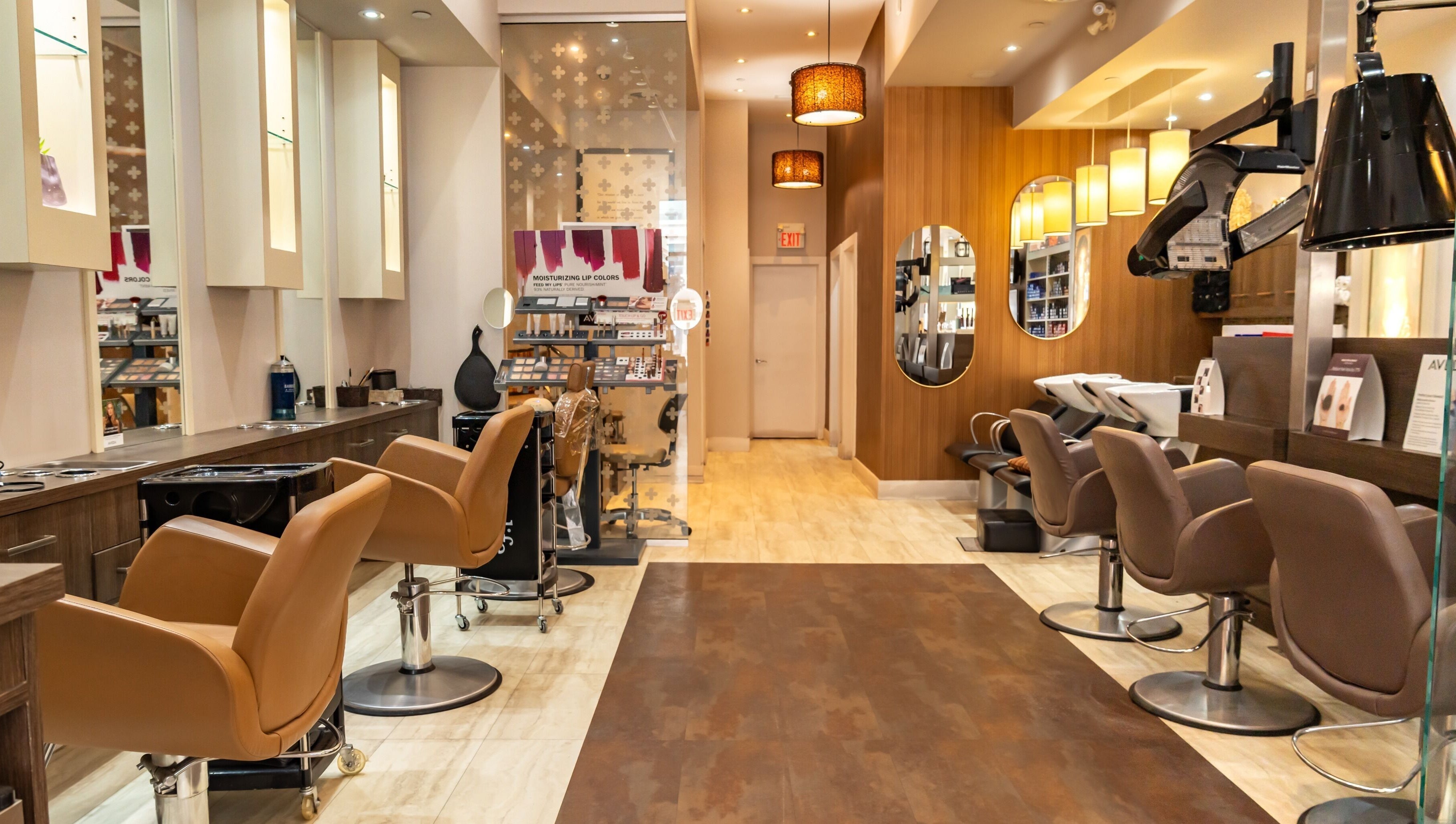 Interior of Pure Self Salon N Spa | AVEDA Salon, featuring luxurious seating in Markham, Ontario, CA.