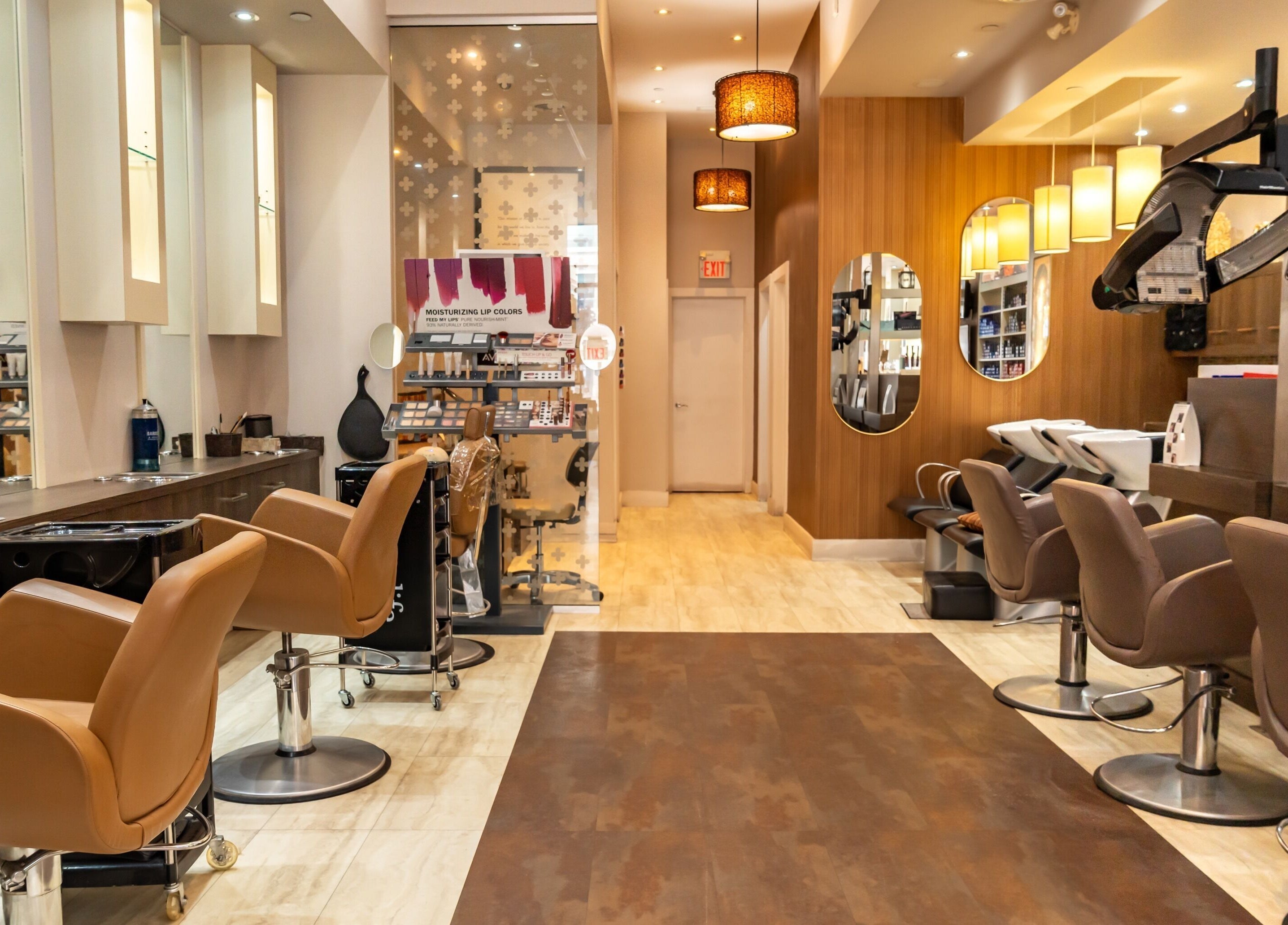 Interior of Pure Self Salon N Spa | AVEDA Salon, featuring luxurious seating in Markham, Ontario, CA.