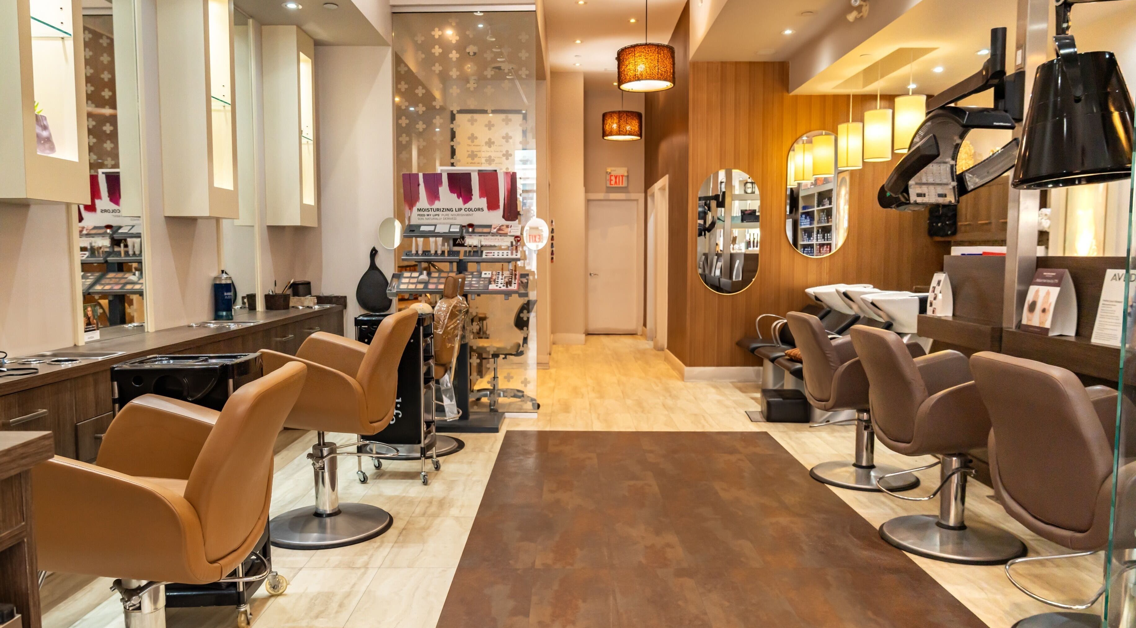 Interior of Pure Self Salon N Spa | AVEDA Salon, featuring luxurious seating in Markham, Ontario, CA.